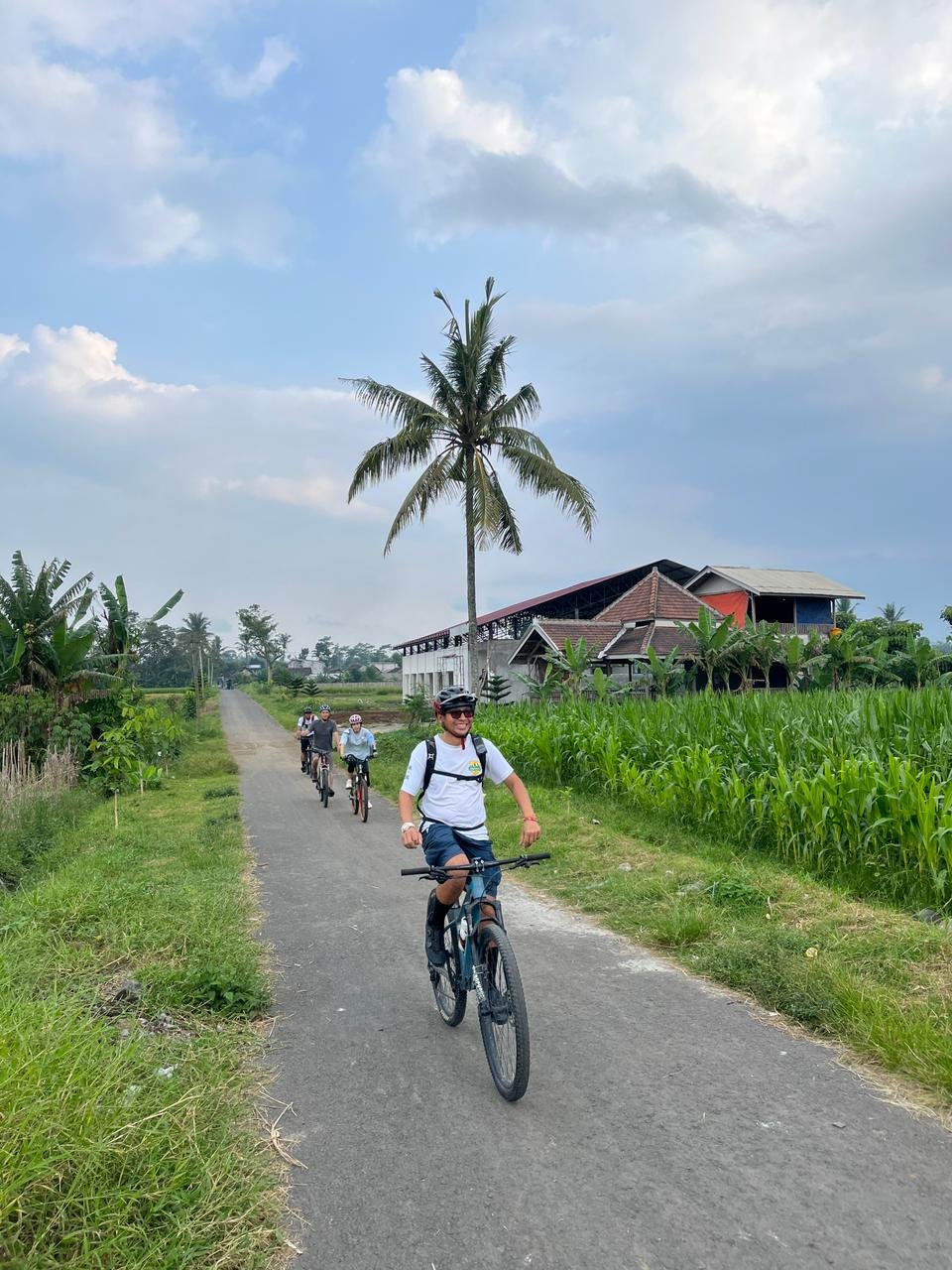 Cycle through Malang's scenic countryside, peaceful villages, lush rice fields, and charming local streets with stunning mountain views.